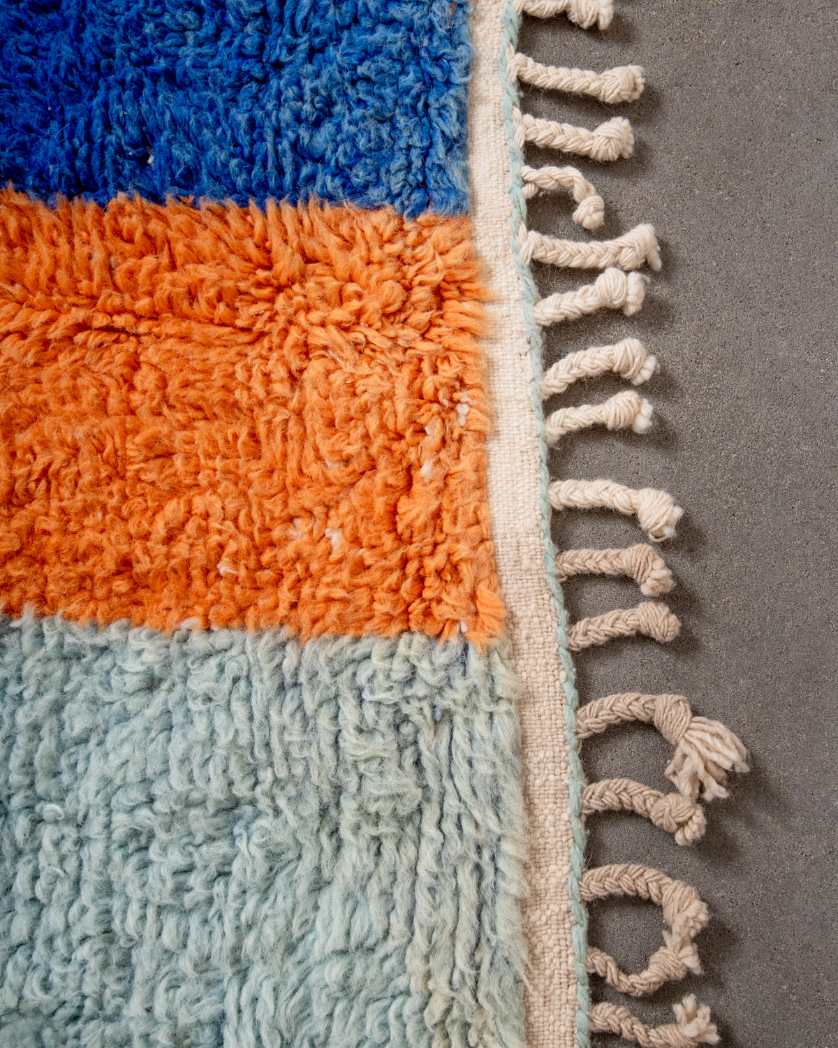 Modern, designer, handcrafted Berber rug from Morocco. Beniourain carpet with beautiful colours and patterns and fluffy wool texture.